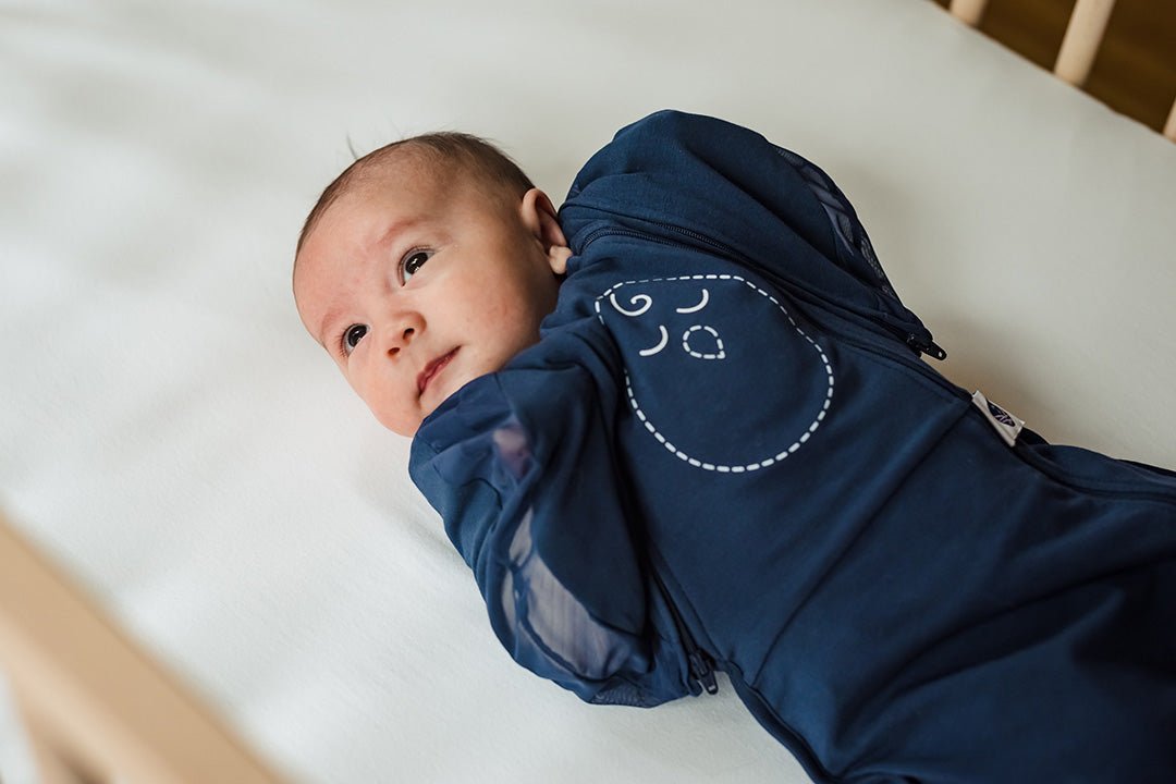 Nested Bean Zen One swaddle in night sky helps babies fighting sleep